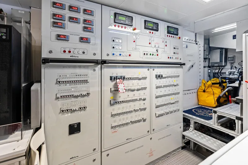 Tenacious Yacht Photos Pics Electrical control room of 2025 Riva 130' Bellissima yacht, featuring advanced panels and equipment.