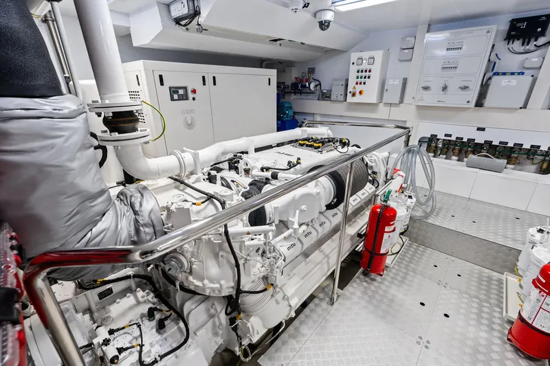 Tenacious Yacht Photos Pics Engine room of 2025 Riva 130' Bellissima yacht, featuring advanced machinery and safety equipment.