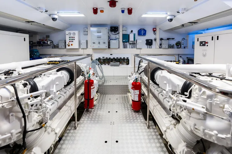 Tenacious Yacht Photos Pics Engine room of 2025 Riva 130' Bellissima yacht, featuring advanced machinery and safety equipment.