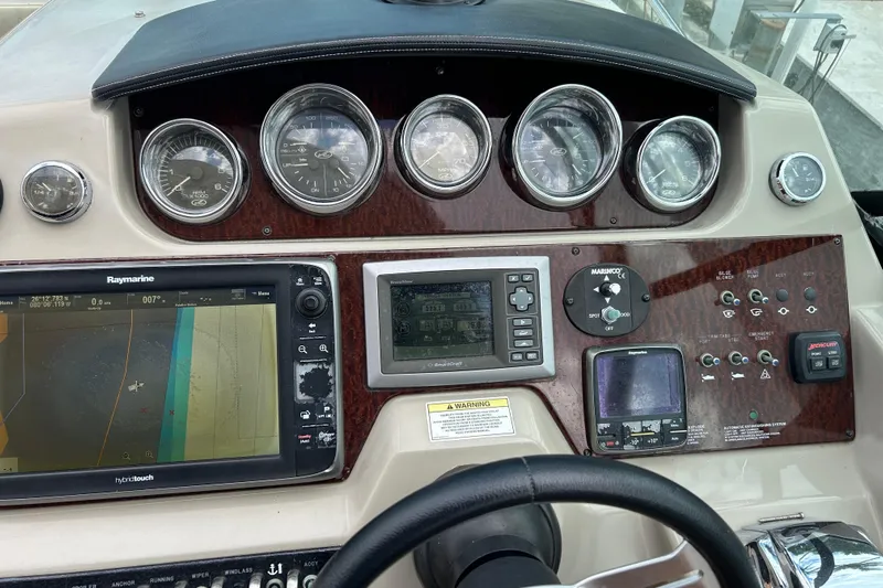 Mr Bojangles Yacht Photos Pics 2014 Sea Ray 370 Venture dashboard with navigation and control instruments.