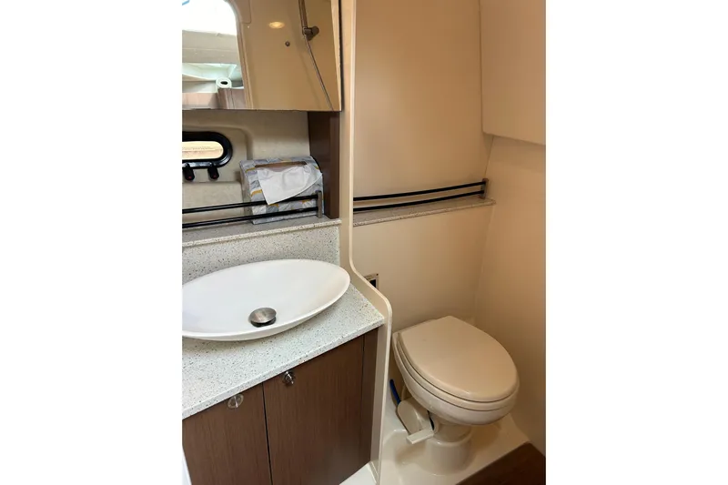 Mr Bojangles Yacht Photos Pics 2014 Sea Ray 370 Venture bathroom with modern sink and toilet.