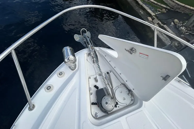Mr Bojangles Yacht Photos Pics 2014 Sea Ray 370 Venture boat anchor compartment with open hatch and railing.