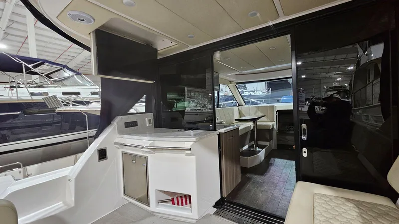  Yacht Photos Pics Interior of 2020 Regal 38 Grand Coupe yacht, featuring modern design and luxurious amenities.