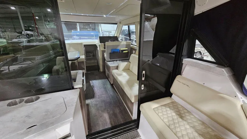  Yacht Photos Pics Interior of 2020 Regal 38 Grand Coupe yacht, featuring luxurious seating and modern design.