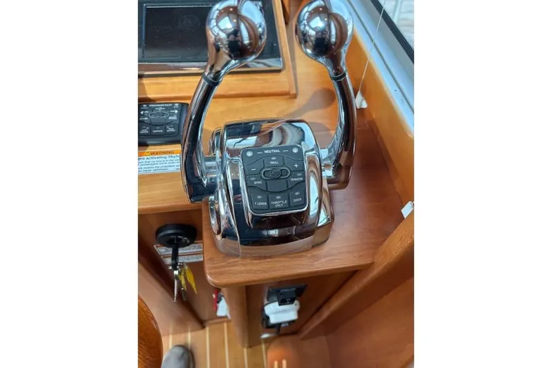  Yacht Photos Pics Control panel of 2015 Sabre 42 Salon Express yacht with dual throttle levers.