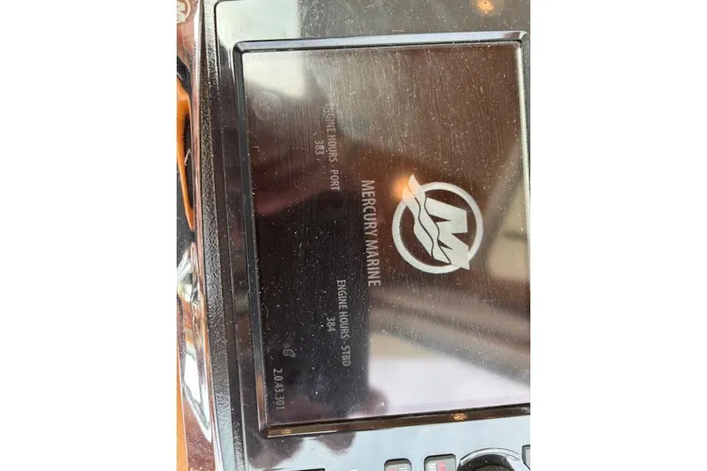  Yacht Photos Pics Display screen on 2015 Sabre 42 Salon Express showing Mercury Marine engine hours.