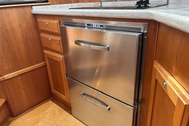  Yacht Photos Pics Stainless steel refrigerator in 2015 Sabre 42 Salon Express yacht kitchen.