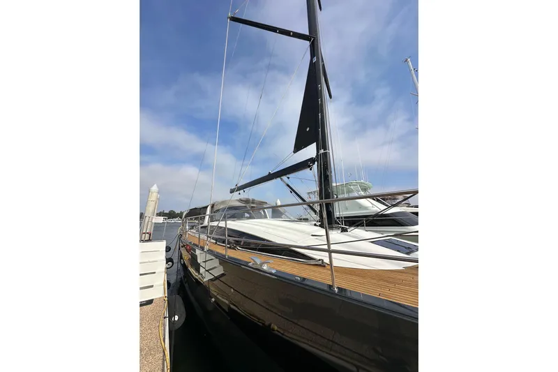 Imagine Yacht Photos Pics 2017 Jeanneau 64 yacht docked, showcasing sleek design and modern features.