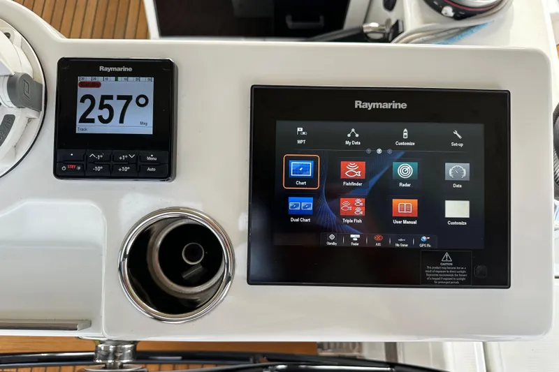 Imagine Yacht Photos Pics Raymarine navigation display on 2017 Jeanneau 64 yacht, showing compass and multifunction screen.