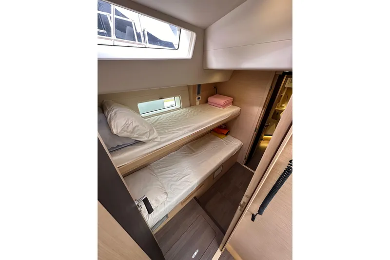 Imagine Yacht Photos Pics 2017 Jeanneau 64 yacht cabin with bunk beds and modern interior design.