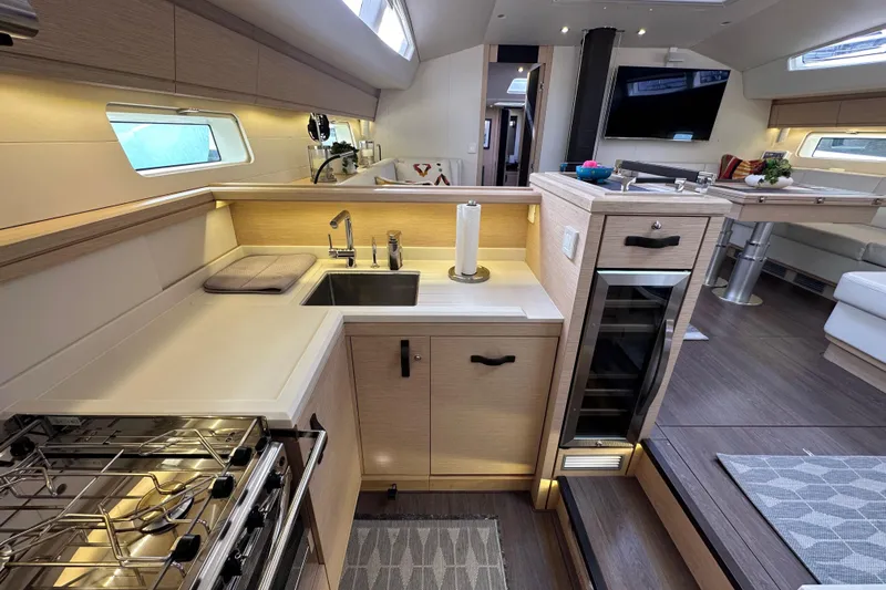 Imagine Yacht Photos Pics Luxurious 2017 Jeanneau 64 yacht interior with modern kitchen and elegant dining area.