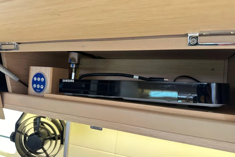 Imagine Yacht Photos Pics Cabinet in 2017 Jeanneau 64 yacht with Samsung device and control panel.