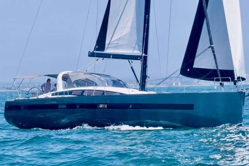 Imagine Yacht Photos Pics 2017 Jeanneau 64 sailing yacht cruising on open water.