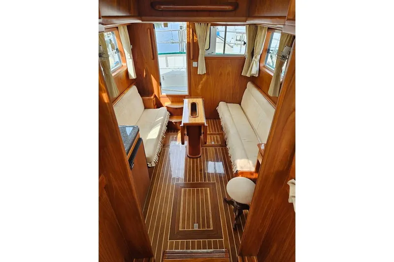 Carquinas Coot Yacht Photos Pics Luxurious 2010 Seahorse COOT yacht interior with elegant wood paneling and comfortable seating.