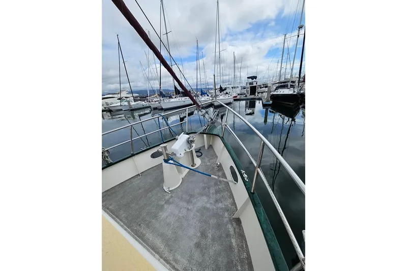 Carquinas Coot Yacht Photos Pics 2010 Seahorse COOT boat docked in a marina with sailboats and calm water.