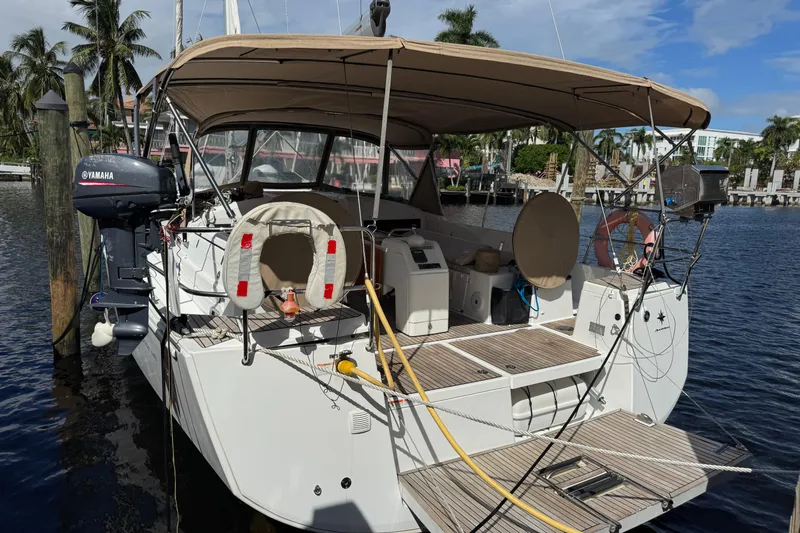 Reventador Yacht Photos Pics 2018 Jeanneau Sun Odyssey 440 docked, featuring Yamaha motor and spacious deck.