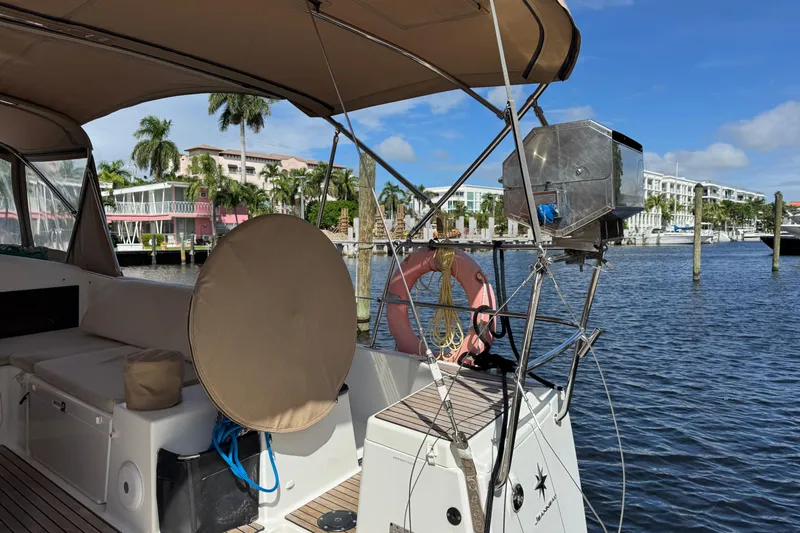 Reventador Yacht Photos Pics 2018 Jeanneau Sun Odyssey 440 yacht docked in a scenic marina.