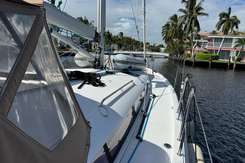 Reventador Yacht Photos Pics Jeanneau Sun Odyssey 440 sailboat docked by palm trees, 2018 model.