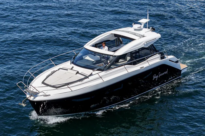 Bag Secured Yacht Photos Pics 2023 Bavaria SR36 yacht cruising on open water, showcasing sleek design and luxury features.