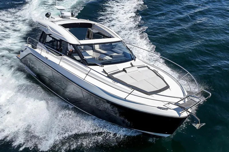 Bag Secured Yacht Photos Pics 2023 Bavaria SR36 yacht cruising on open water, showcasing sleek design and luxury features.