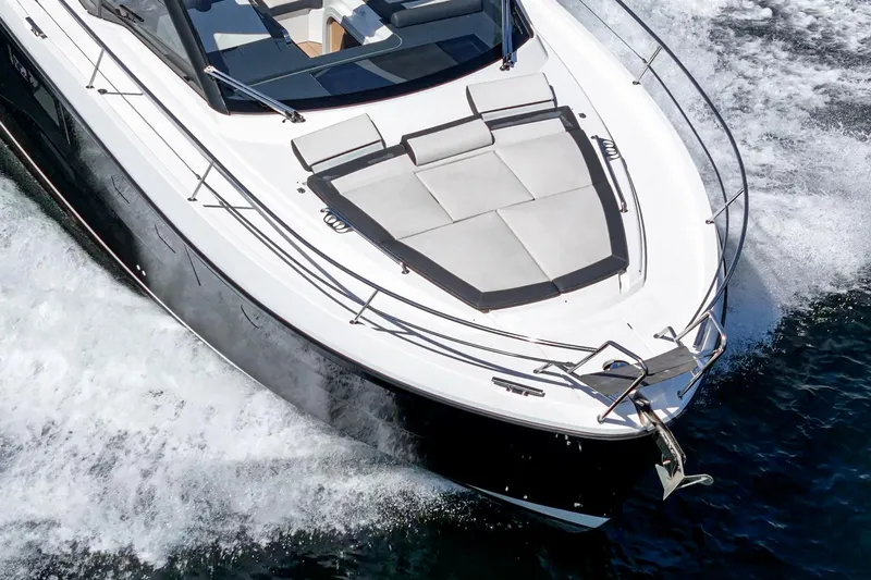 Bag Secured Yacht Photos Pics 2023 Bavaria SR36 yacht cruising on water, featuring sleek design and spacious deck.