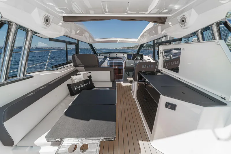 Bag Secured Yacht Photos Pics Luxurious 2023 Bavaria SR36 yacht interior with sleek seating and modern design.