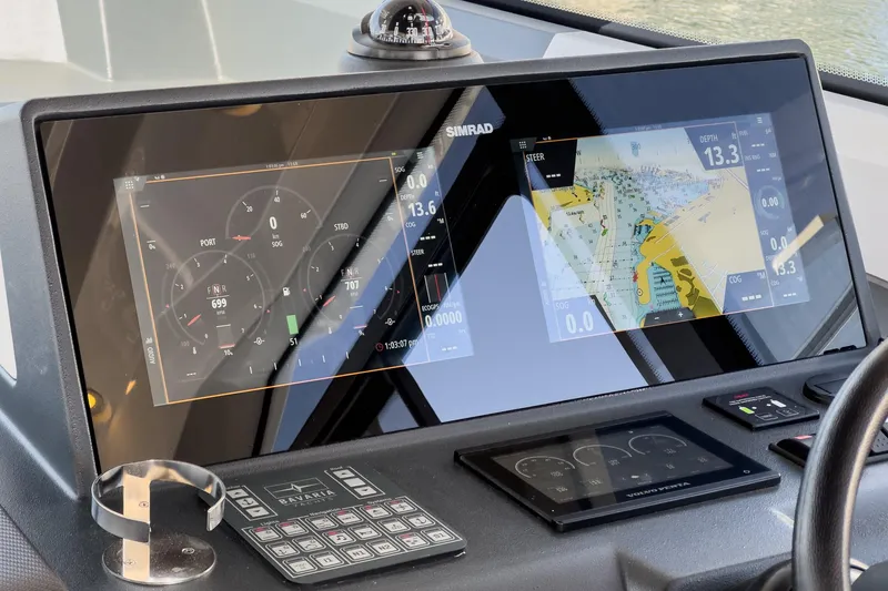 Bag Secured Yacht Photos Pics Dashboard of 2023 Bavaria SR36 boat with navigation and control displays.