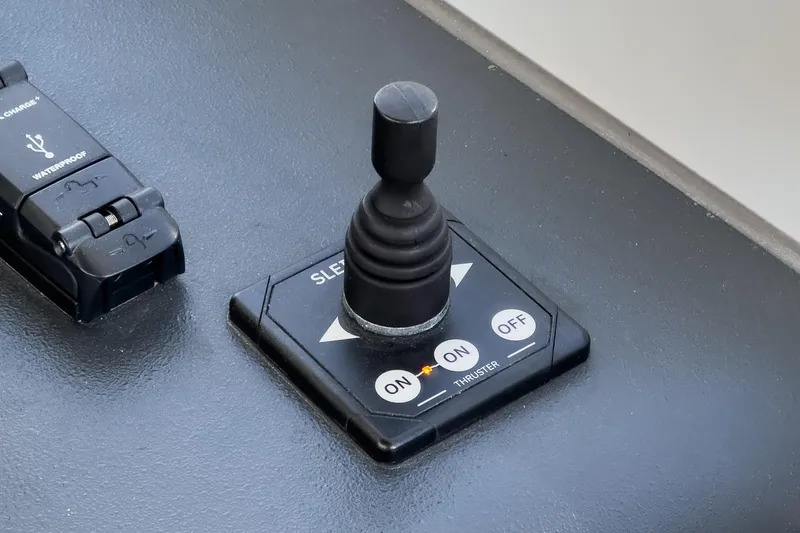 Bag Secured Yacht Photos Pics Joystick control panel on 2023 Bavaria SR36 boat dashboard.