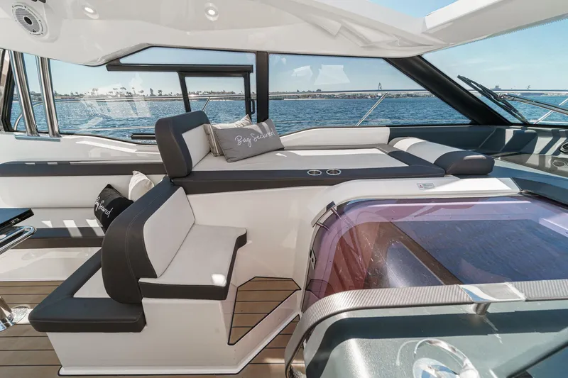 Bag Secured Yacht Photos Pics Luxurious 2023 Bavaria SR36 yacht interior with sleek seating and ocean view.