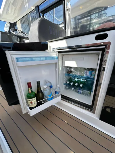 Bag Secured Yacht Photos Pics 2023 Bavaria SR36 yacht fridge with drinks, open on deck.