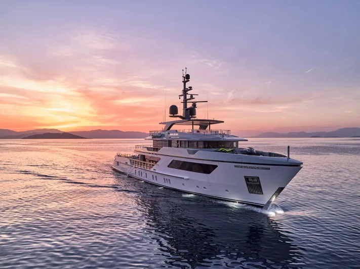 Para Bellum Yacht Photos Pics Sanlorenzo 500EXP yacht cruising at sunset, 2023 model, on calm waters.