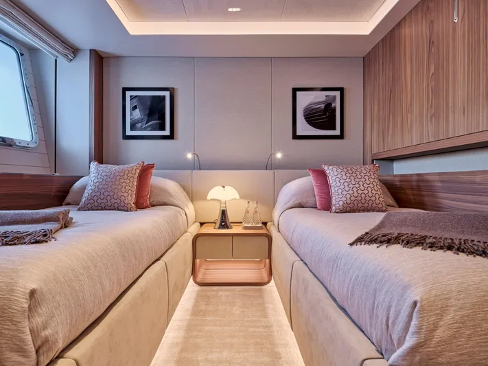Para Bellum Yacht Photos Pics Luxurious twin bedroom on 2023 Sanlorenzo 500EXP yacht, featuring elegant decor and modern lighting.