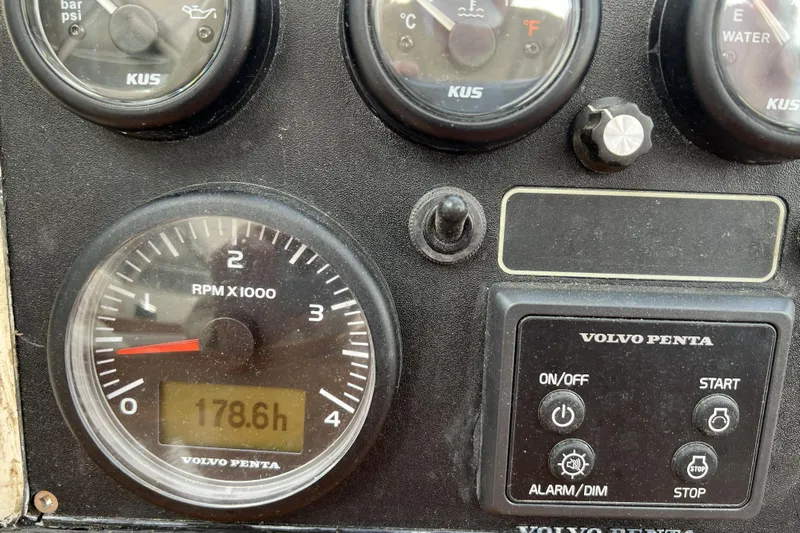 Raison D'etre Yacht Photos Pics Control panel of a 1988 Hallberg Rassy 42E sailboat with Volvo Penta gauges.