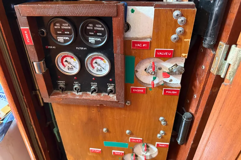Raison D'etre Yacht Photos Pics Control panel of a 1988 Hallberg Rassy 42E yacht with fuel and valve indicators.