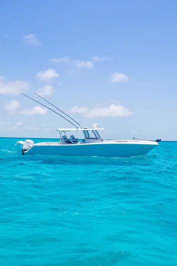  Yacht Photos Pics Front Runner 43 Catamaran 2026 on clear turquoise water under blue sky.