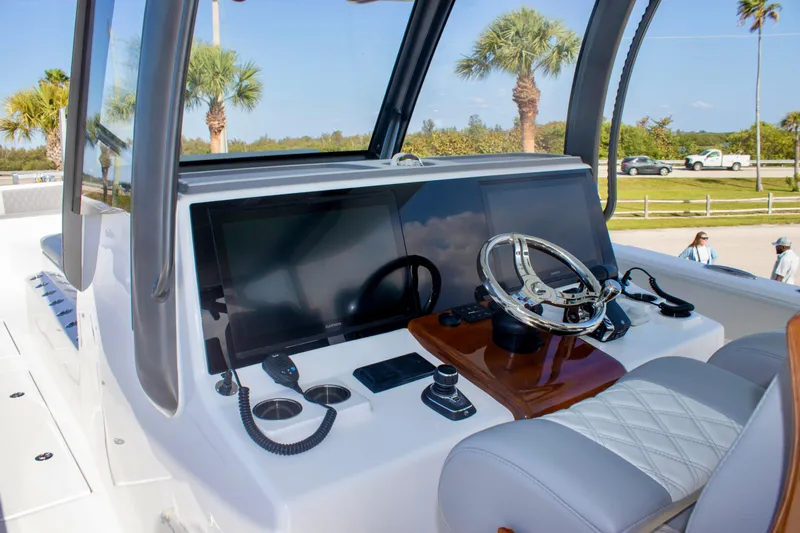  Yacht Photos Pics 2026 Front Runner 43 Catamaran helm with modern controls and steering wheel.