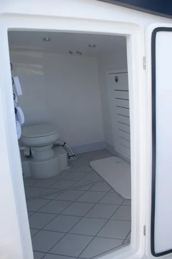  Yacht Photos Pics 2026 Front Runner 43 Catamaran bathroom interior with modern fixtures and tiled flooring.