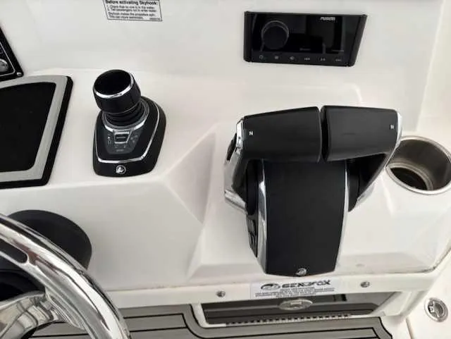 Black Label Marine Yacht Photos Pics Control panel of 2023 Sea Fox 328 Commander boat with throttle and joystick.