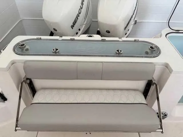 Black Label Marine Yacht Photos Pics 2023 Sea Fox 328 Commander boat with dual Mercury engines and cushioned seating.