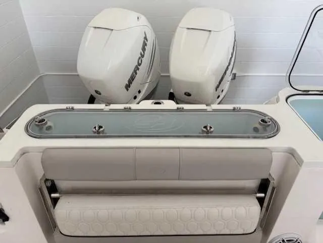 Black Label Marine Yacht Photos Pics 2023 Sea Fox 328 Commander boat with dual Mercury engines and seating area.