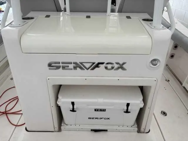 Black Label Marine Yacht Photos Pics 2023 Sea Fox 328 Commander boat interior with branded cooler storage.