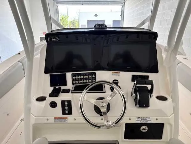 Black Label Marine Yacht Photos Pics 2023 Sea Fox 328 Commander helm with dual displays and modern controls.
