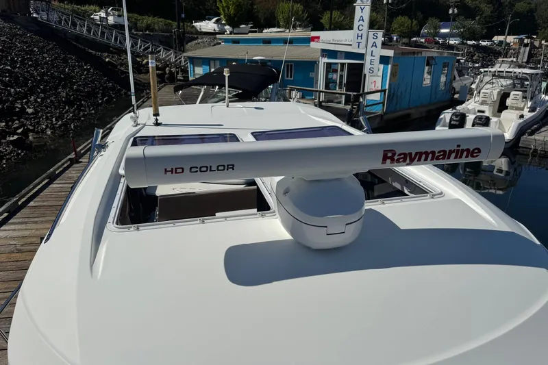  Yacht Photos Pics 2017 Jeanneau 895 Offshore boat with Raymarine HD Color radar at marina dock.