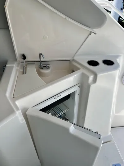 Nola Yacht Photos Pics 2007 Tiara Yachts 3900 Sovran kitchenette with sink and storage.