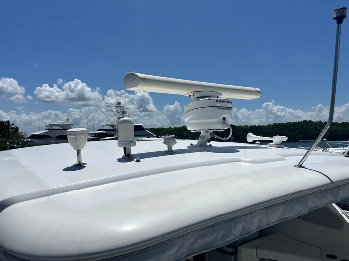 Nola Yacht Photos Pics Radar equipment on 2007 Tiara Yachts 3900 Sovran under clear blue sky.