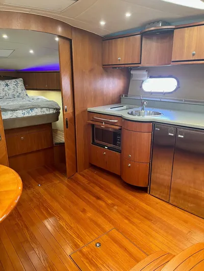 Nola Yacht Photos Pics Luxurious 2007 Tiara Yachts 3900 Sovran interior with wood finish and modern amenities.