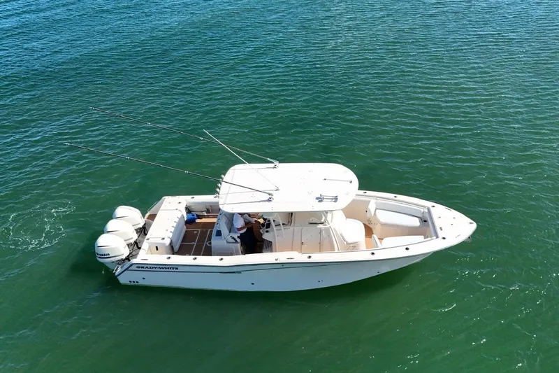  Yacht Photos Pics 2018 Grady-White Canyon 336 boat on clear blue water, aerial view.