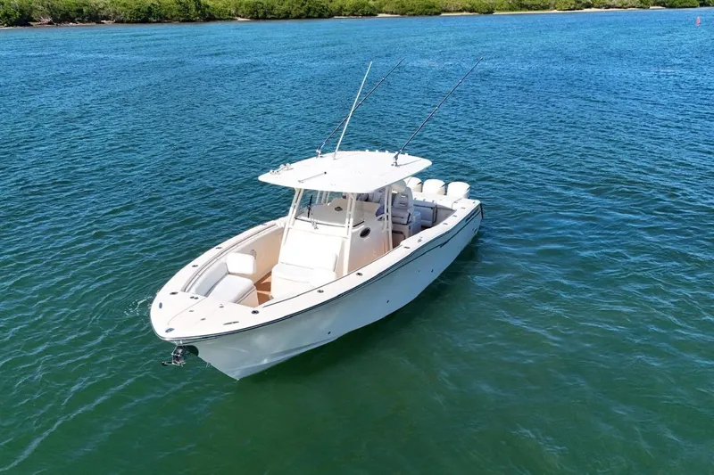  Yacht Photos Pics 2018 Grady-White Canyon 336 boat on calm blue water.