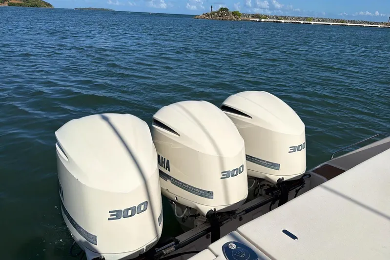  Yacht Photos Pics 2018 Grady-White Canyon 336 with triple Yamaha 300 outboard engines on the water.