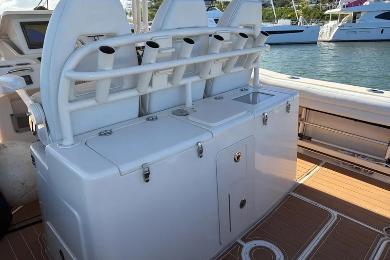  Yacht Photos Pics 2018 Grady-White Canyon 336 boat interior with rod holders and sink.